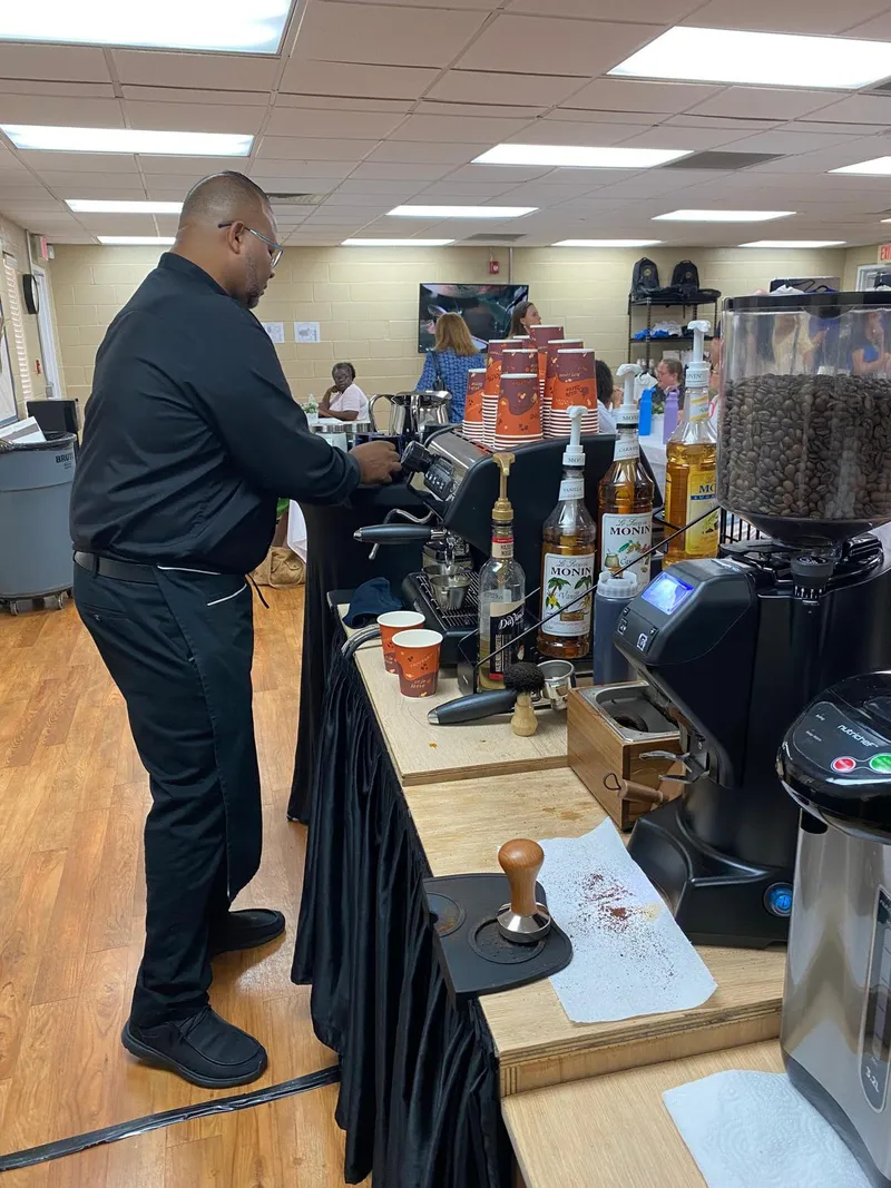 Barista at the espresso bar during an employee appreciation event in an office